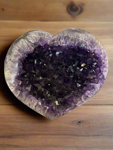 Load image into Gallery viewer, Close-up of Uruguay amethyst heart showing deep purple color, polished finish, and natural crystal details