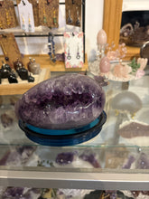 Load image into Gallery viewer, Brazilian amethyst egg geode displaying rich purple color and expertly polished exterior finish