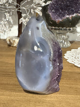 Load image into Gallery viewer, Detail view of polished Brazilian agate flame displaying purple druzy and ethereal grey-to-blue banding