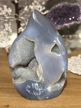 Load image into Gallery viewer, Brazilian agate flame polished specimen with grey banding and four interconnected crystal cavities 11.5cm height