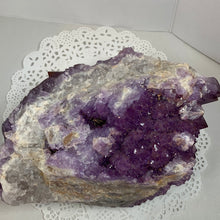 Load image into Gallery viewer, Back view of amethyst cluster showing small crystal pockets and natural formations