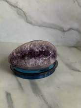 Load image into Gallery viewer, Polished Brazilian amethyst geode egg showing deep purple crystal formations, 14cm tall, 1.017kg