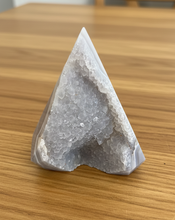 Load image into Gallery viewer, Pyramid-shaped agate geode with natural crystal window showing sparkling druzy formations and milky grey banding