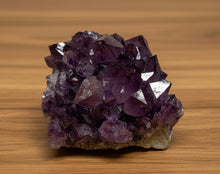 Load image into Gallery viewer, Thunder Bay amethyst specimen side view - 4.5x4x3cm compact with purple hue and hematite

