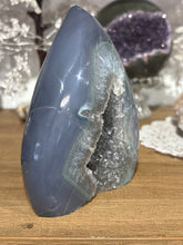 Load image into Gallery viewer, Close-up of large Brazilian agate flame showing clear sparkling grey crystals and dramatic color depth
