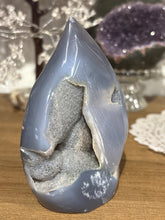 Load image into Gallery viewer, Brazilian agate flame polished specimen with grey banding and four interconnected crystal cavities 11.5cm height
