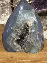 Load image into Gallery viewer, Large Brazilian agate flame polished specimen with dark grey crystal druzy formations 11.5cm height
