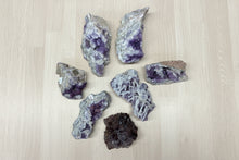 Load image into Gallery viewer, Chunky Thunder Bay amethyst collection of 7 unique specimens ranging 17cm to 9cm with hematite inclusions from Diamond Willow Mine

