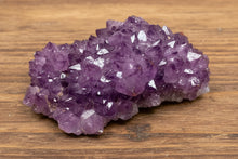 Load image into Gallery viewer, Purple Thunder Bay amethyst with hematite inclusions - side angle showing crystal formation

