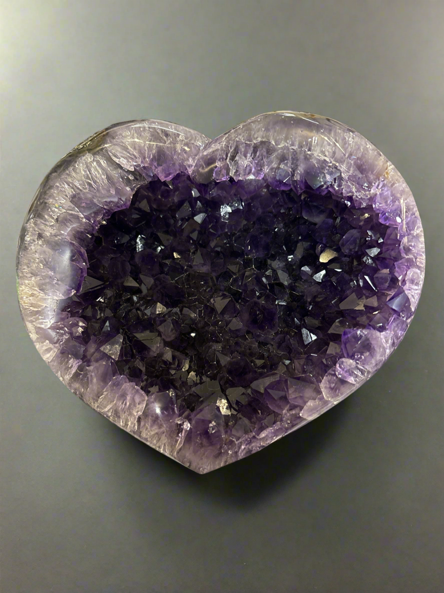 Polished amethyst heart from Uruguay displaying rich purple hue and stunning crystal formations, 18cm x 16cm, 2.064kg
