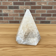 Load image into Gallery viewer, Clear quartz crystal pyramid with natural golden-brown inclusions and phantom formations from Thunder Bay, hand-polished to museum quality
