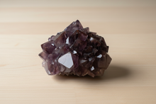 Load image into Gallery viewer, Thunder Bay amethyst on light wood - view 2
